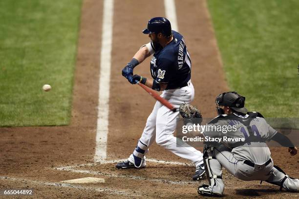 Kirk Nieuwenhuis of the Milwaukee Brewers swings at a pitch during the sixth inning of a game against the Colorado Rockies at Miller Park on April 5,...