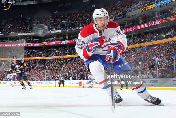 Brian Flynn of the Montreal Canadiens follows the flying puck during an NHL game against the Buffalo Sabres at the KeyBank Center on April 5, 2017 in...