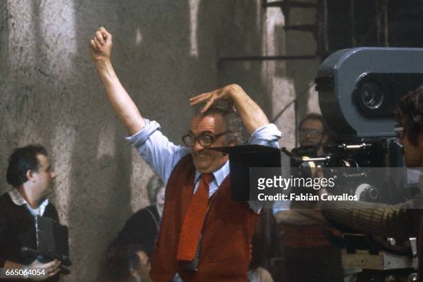 Italian film director Federico Fellini directs his actors in his 1980 film entitled La Citta delle Donne. The film was released as City of Women in...