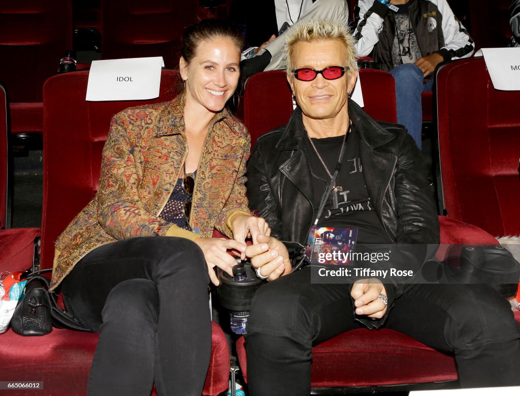 Linda Mathis and musician Billy Idol attend 'Shot! The Psycho News