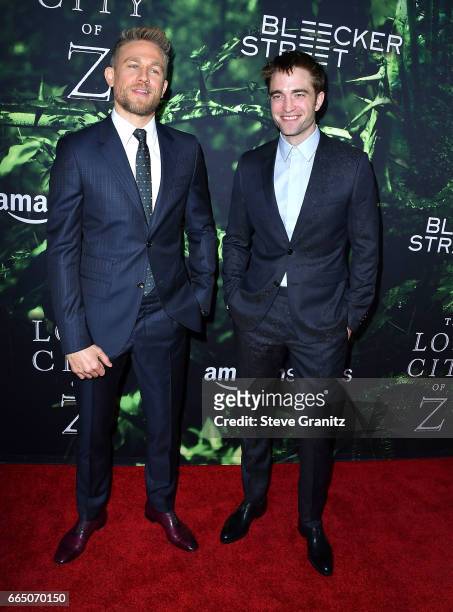Charlie Hunnam, Robert Pattinson arrives at the Premiere Of Amazon Studios' "The Lost City Of Z" at ArcLight Hollywood on April 5, 2017 in Hollywood,...