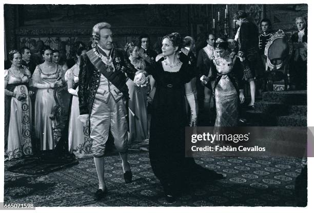 Actors Marthe Keller and George Wilson hold each other's arms during an aristocratic ball in a scene taken from the movie La Certosa di Parma (La...