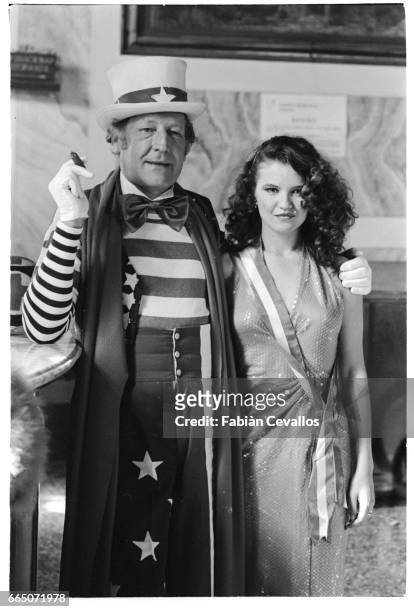 French actor Georges Wilson stand with a member of the cast of the 1981 Italian film, Nudo di Donna. Directed by Alberto Lattuada and Nino Manfredi,...