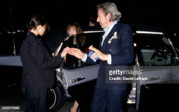 French singer and songwriter Serge Gainsbourg attends the 11th Cesar Awards ceremony with his partner Jane Birkin and their daughter Charlotte...