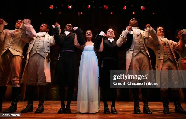 The cast of Hamilton takes a bow during a curtain call as the production makes its Chicago premiere on Wednesday, Oct. 19, 2016 at PrivateBank...