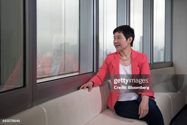 Li Ting, chief executive officer of Yunfeng Financial Group Ltd., poses for a photograph in Hong Kong, China, on Thursday, April 6, 2017. Yunfeng,...