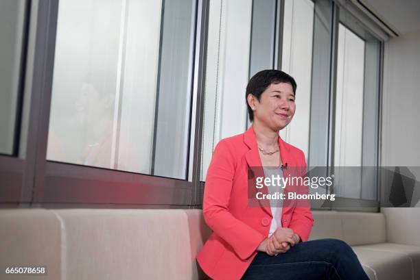 Li Ting, chief executive officer of Yunfeng Financial Group Ltd., listens during an interview in Hong Kong, China, on Thursday, April 6, 2017....