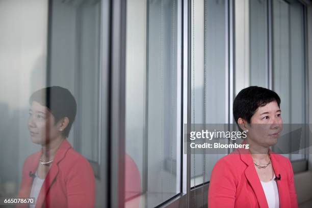 Li Ting, chief executive officer of Yunfeng Financial Group Ltd., listens during an interview in Hong Kong, China, on Thursday, April 6, 2017....