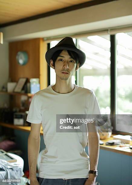 portrait of young man wearing hat - white man waist up stock pictures, royalty-free photos & images