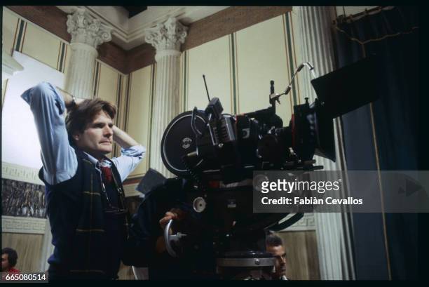 American director Stuart Cooper sits behind a camera on the set of his TV mini-series Anno Domini, set just after the death of Jesus Christ and...
