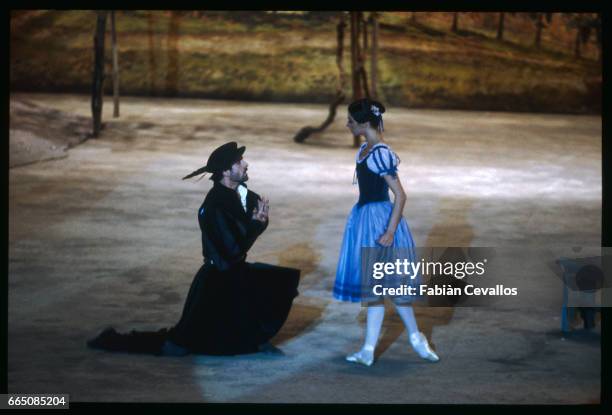 Italian Alessandra Ferri, as Giselle, and Australian Desmond Kelly, as the Duke of Courland, dance in the ballet Giselle. The ballet provides the...