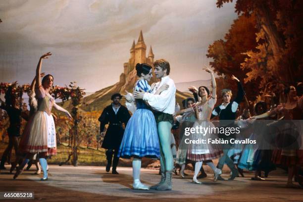 Dancing the roles of Giselle and Albrecht, Italian Alessandra Ferri and Latvian Mikhail Baryshnikov embrace in the ballet Giselle, as Australian...