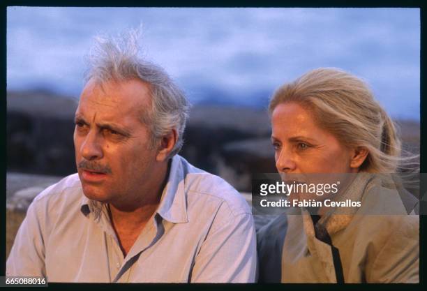 Actors Virna Lisi and Michel Serrault on the set of Buon Natale... Buon Anno, a film directed by Luigi Comencini. The French and English titles of...