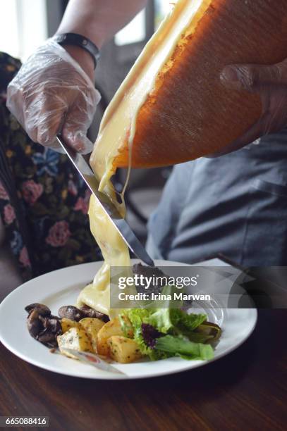 raclette steak - melted cheese stock pictures, royalty-free photos & images