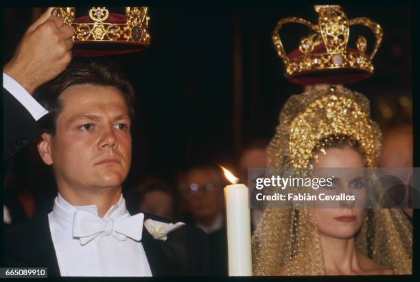 Olga Rostropovich and Olaf Guerrand-Hermes crowned at the orthodox church for their wedding.