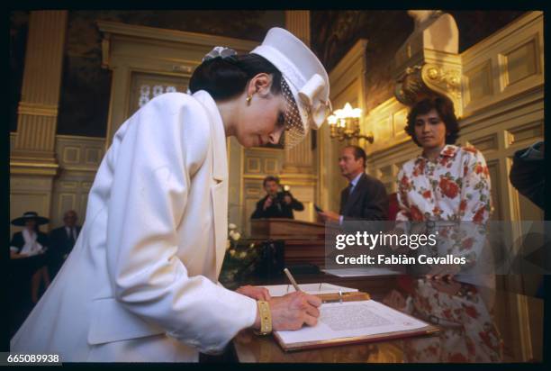 Olga Rostropovich signs the wedding book at Paris town hall, thus becoming Mrs. Olga Guerrand-Hermes.