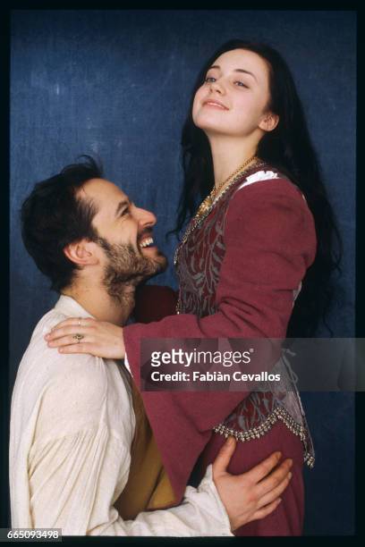 Actors Monica Keena and Gil Bellows smile and embrace each other on the set of the movie Snow White: A Tale of Terror . Directed by Michael Cohn,...