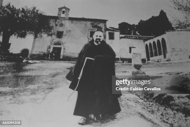 Padre Pio in front of the Capucin convent.