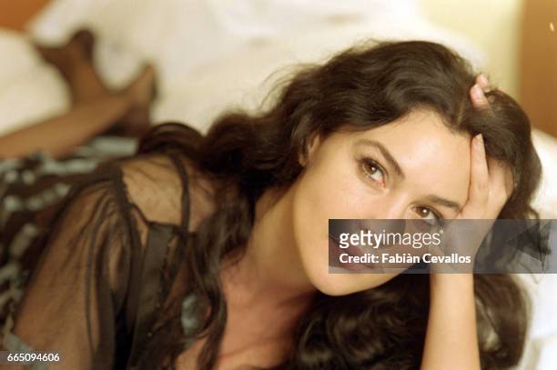 Italian actress Monica Bellucci, with her hand in her hair, takes a break in her dressing room from the shooting of the Italian director Giuseppe...