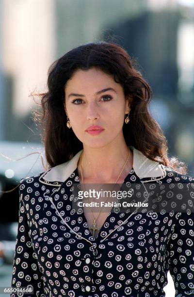 Italian actress Monica Bellucci, wearing a black dress, poses for a portrait on the set of the Italian director Giuseppe Tornatore's film Malena. On...
