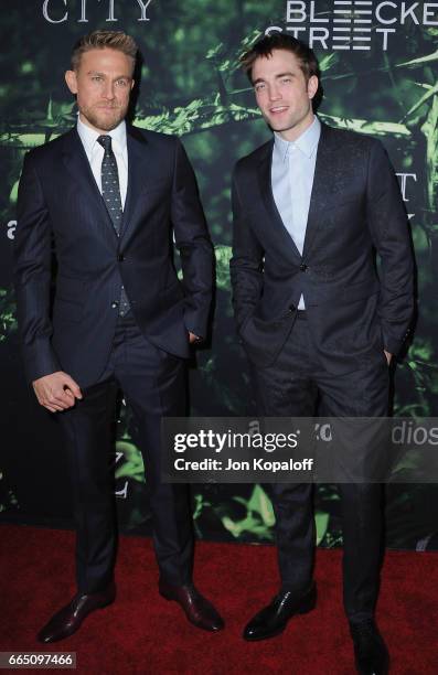 Actors Charlie Hunnam and Robert Pattinson arrive at the Premiere Of Amazon Studios' "The Lost City Of Z" at ArcLight Hollywood on April 5, 2017 in...