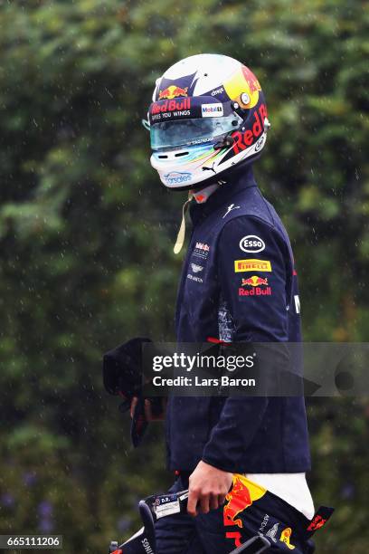 Daniel Ricciardo of Australia and Red Bull Racing walks in the Paddock during previews to the Formula One Grand Prix of China at Shanghai...