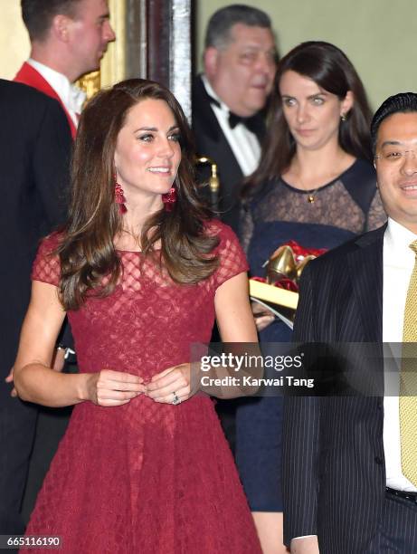 Catherine, Duchess of Cambridge and Sophie Agnew attend the opening night of "42nd Street" at Theatre Royal on April 4, 2017 in London, England. The...