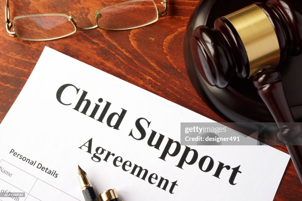 Child support agreement on an office table.