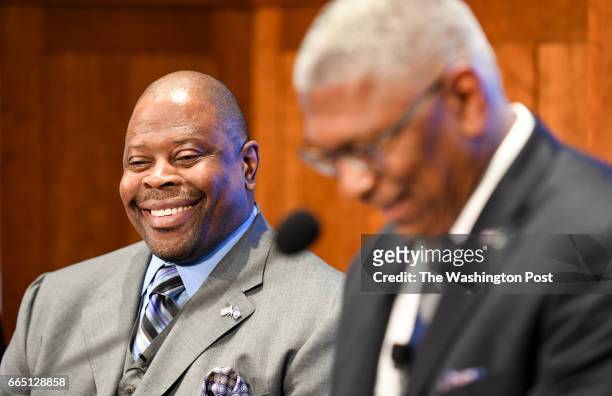 Patrick Ewing smiles as he is introduced as the new head coach of the Georgetown Men's Basketball team by Athletic Director Lee Reed in Washington,...