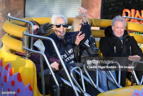 Year-old Jack Reynolds rides the Twistersaurus rollercoaster to raise money for the Derbyshire, Leicestershire and Rutland Air Ambulance fund with...