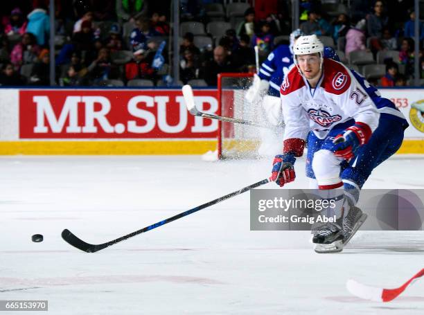 Stefan Matteau of the St. John's IceCaps controls the puck against the Toronto Marlies during AHL game action on April 4, 2017 at Ricoh Coliseum in...