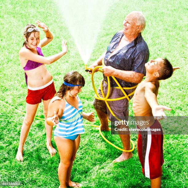 grandfather and grandchildren - teenager man mischievous stock pictures, royalty-free photos & images