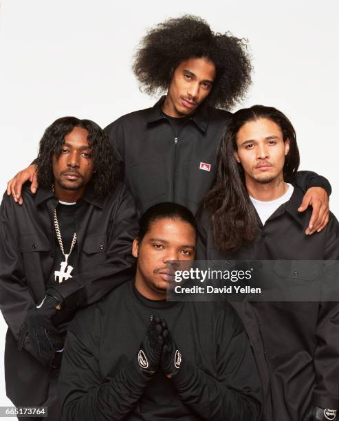 Rap group Bone Thugs-N-Harmony are photographed for XXL Magazine in 2002.