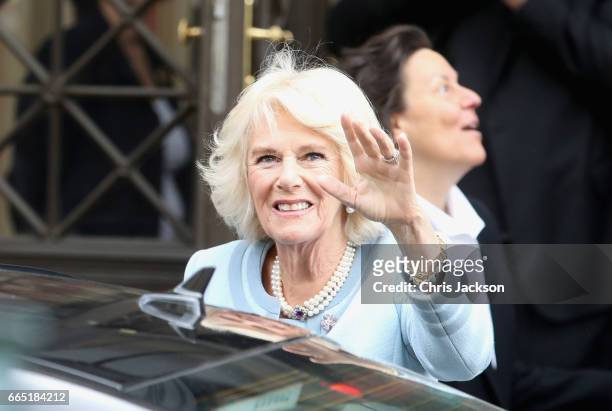 Camilla, Duchess of Cornwall waves to wellwishers after a visit to the Musikverein, home of the 175 year old Vienna Philharmonic Orchestra on April...