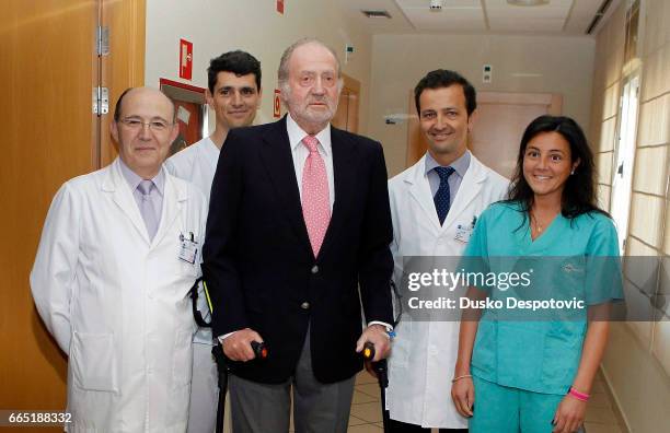 Spanish King Juan Carlos walks on crutches as he is discharged from the Hospital USP San Jose in Madrid, Spain, 05 June 2011. The Spanish King was...