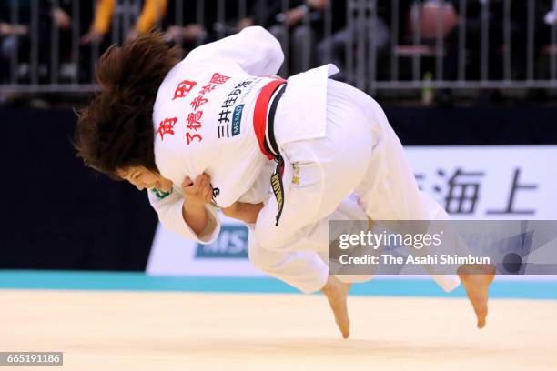 Ai Shishime throws Natsumi Tsunoda in the Women's -52kg final during day two of the All Japan Invitational Judo Championships By Weight Category at...