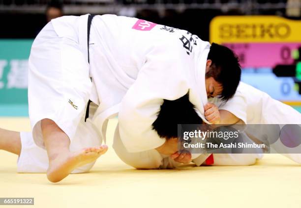 Takeshi Ojitani and Kokoro Kageura compete in the Men's +100kg during day two of the All Japan Invitational Judo Championships By Weight Category at...