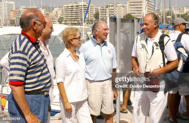 King Juan Carlos, Carolina Herrera and her husband Reinaldo Herrera at the 21st "Copa del Rey" regatta.