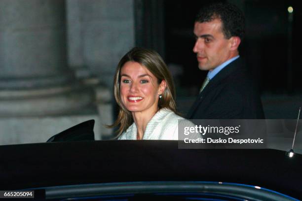 Letizia Ortiz arrives at the Royal Theatre with fiancee Prince Felipe during their first public appearance. They're here to attend a concert by...