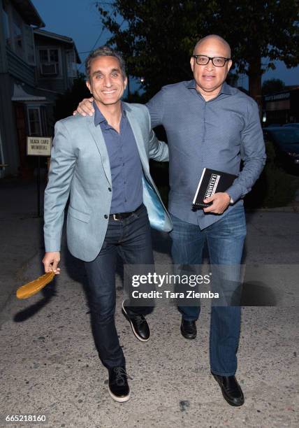 Comedian Larry Wilmore and Egyptian satirist/television host Bassem Youssef arrive for opening night of Sarkasmos Productions' 'Tickling Giants' at...