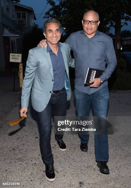 Comedian Larry Wilmore and Egyptian satirist/television host Bassem Youssef arrive for opening night of Sarkasmos Productions' 'Tickling Giants' at...