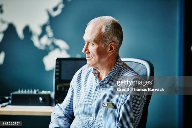 businessman listening during project discussion in high tech office - grey shirt stock pictures, royalty-free photos & images