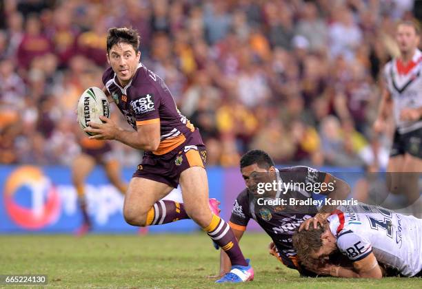 Ben Hunt of the Broncos breaks away from the defence during the round six NRL match between the Brisbane Broncos and the Sydney Roosters at Suncorp...