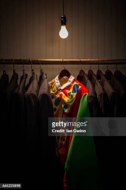clown suit in closet - ian gwinn stock pictures, royalty-free photos & images