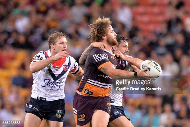 Korbin Sims of the Broncos gets a pass away during the round six NRL match between the Brisbane Broncos and the Sydney Roosters at Suncorp Stadium on...