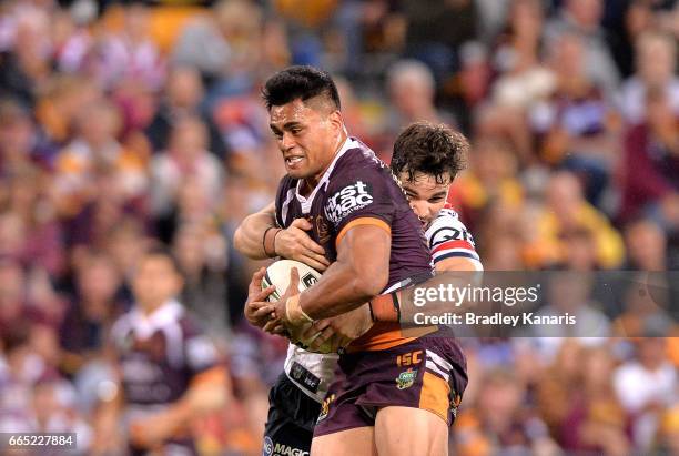 Herman Ese'Ese of the Broncos attempts to break away from the defence during the round six NRL match between the Brisbane Broncos and the Sydney...