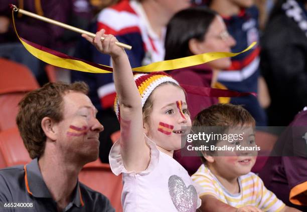 Young fan shows her support during the round six NRL match between the Brisbane Broncos and the Sydney Roosters at Suncorp Stadium on April 6, 2017...