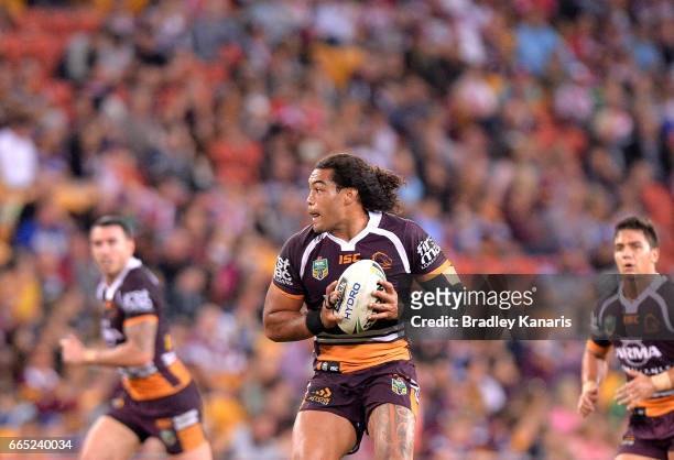 Adam Blair of the Broncos looks to pass during the round six NRL match between the Brisbane Broncos and the Sydney Roosters at Suncorp Stadium on...
