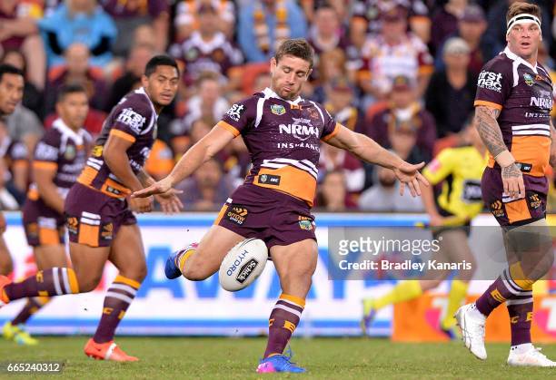 Andrew McCullough of the Broncos kicks the ball during the round six NRL match between the Brisbane Broncos and the Sydney Roosters at Suncorp...