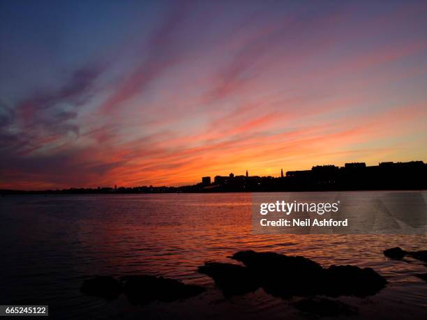 wide view of plymouth skyline at sunset from mount batten - batten stock pictures, royalty-free photos & images